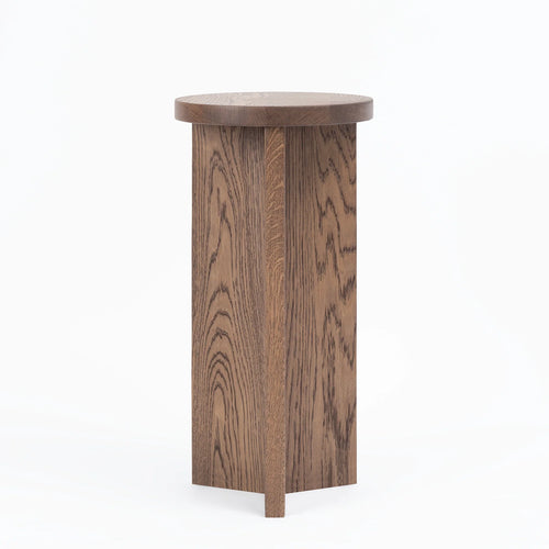 Affe pedestal in dark oak wood with a minimalistic design, perfect for modern home decor.