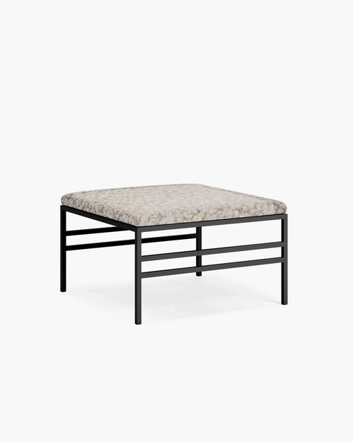 Anton Bench featuring soft ivory bouclé upholstery with a bold black metal frame, perfect for adding contrast to any interior.