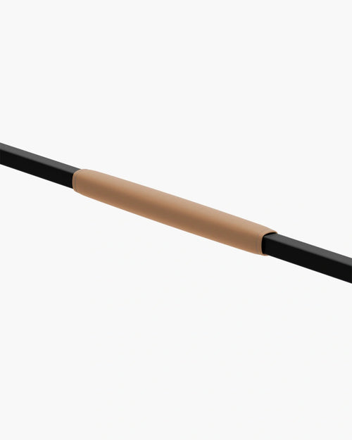 Sleek vegan leather armrest on a contemporary chair, combining comfort and modern design for a stylish touch.