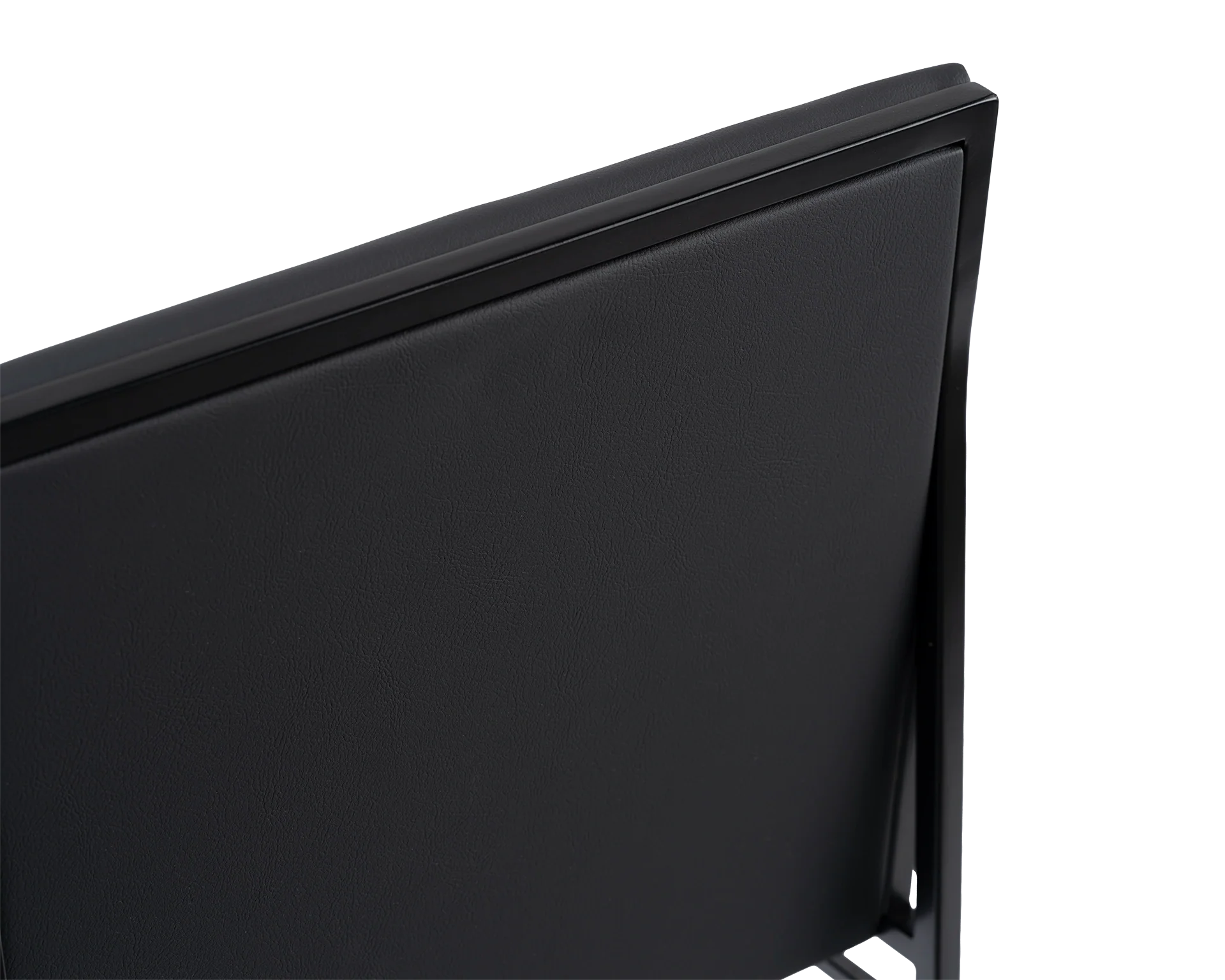 Close-up of the Bella Dining Chair backrest by by Crea, featuring smooth black vegan leather upholstery framed by a sleek black steel structure, showcasing the chair’s refined Scandinavian craftsmanship.