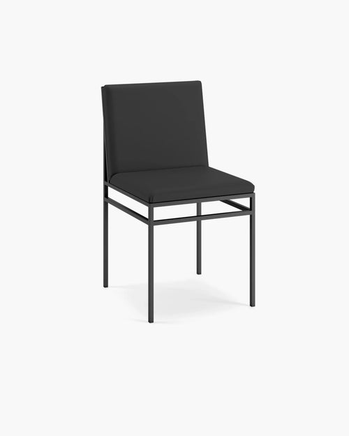 Bella dining chair featuring a sleek black design, perfect for minimal interiors and everyday comfort.
