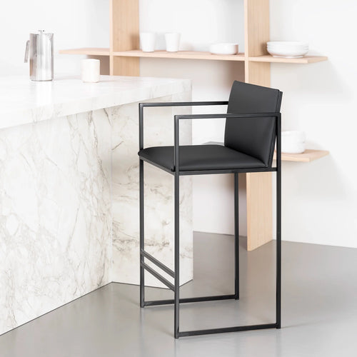 Bruno bar stool in jade black leather with black frame, stylish seating for kitchen bars and high-top counters.