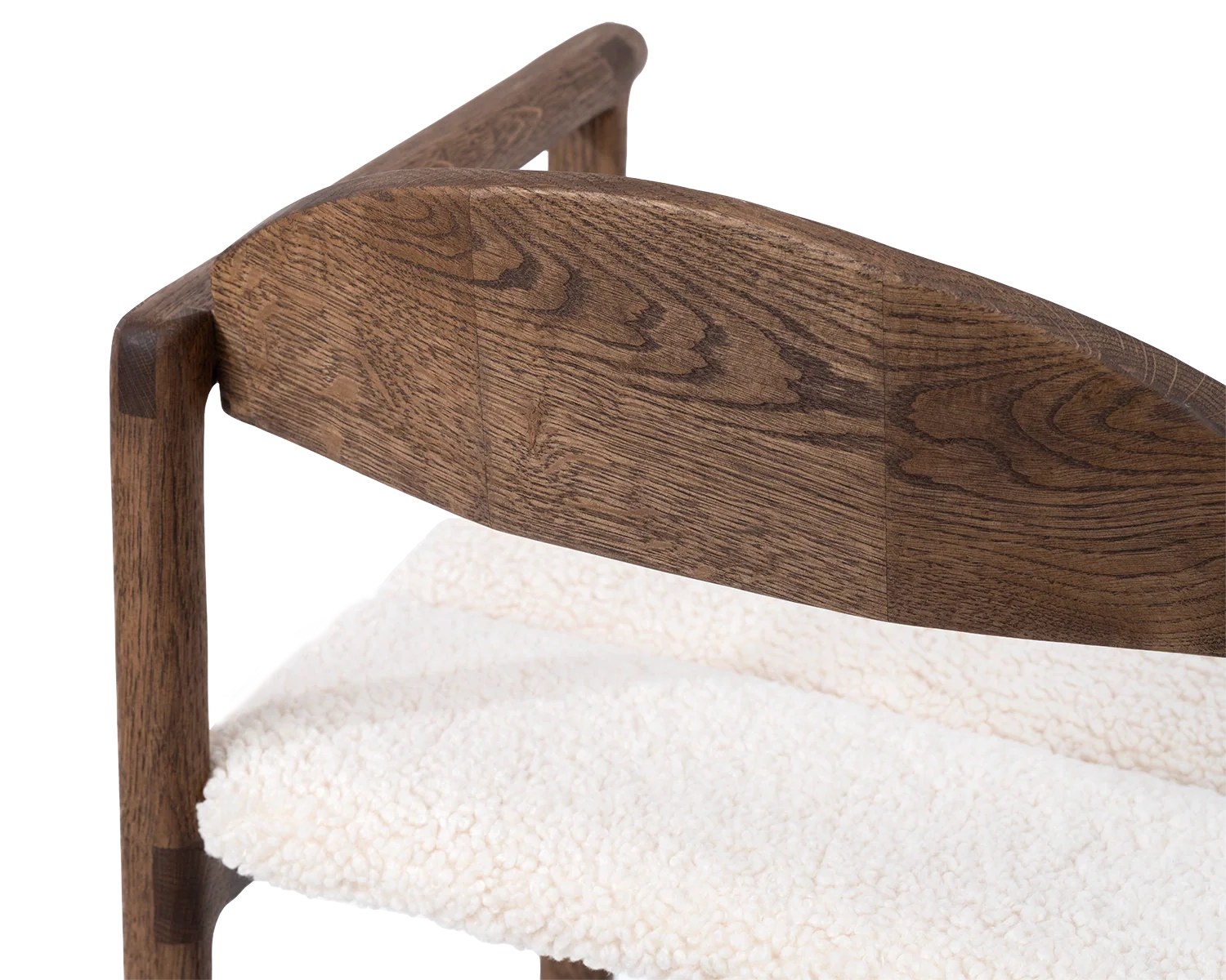 Rear view of Carl Bar Stool in dark oak with detailed joinery on the curved wooden backrest and ivory bouclé seat | by Crea.