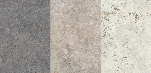 Dekton stone samples in a gradient of shades: dark graphite, soft taupe, and light beige with natural speckled texture, ideal for contemporary kitchen countertops, furniture surfaces, or interior detailing.