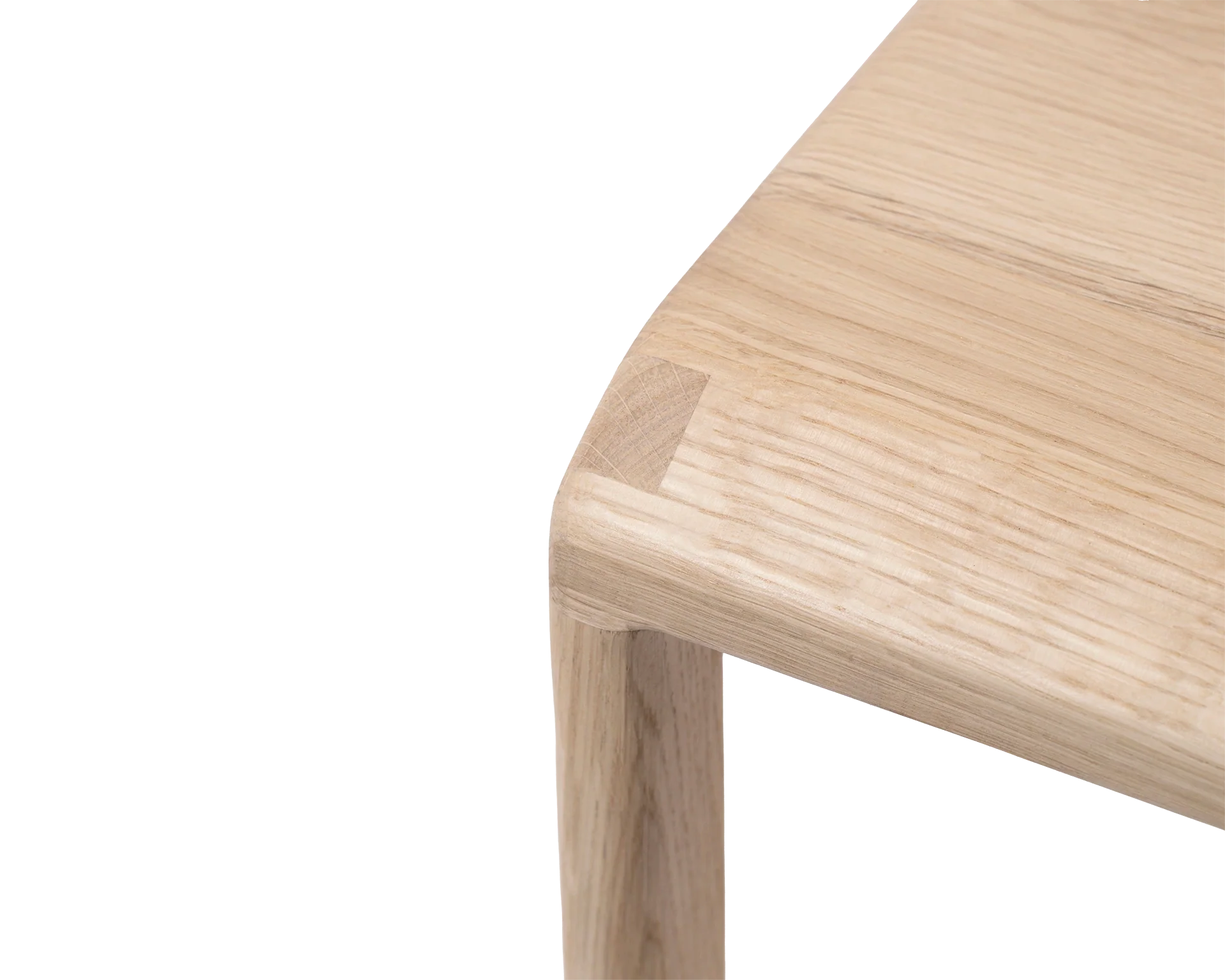 Close-up of the Eva Bar Stool by Crea highlighting the rounded seat corner crafted in solid light oak, showcasing the natural wood grain and Scandinavian minimalist design.