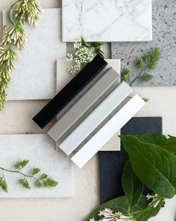 Collection of frame color samples on textured backgrounds to help you choose the perfect finish for your home.