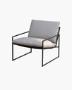 Kenny Lounge chair in black with fossil acrylic cushions, blending modern design and comfort for any living space.