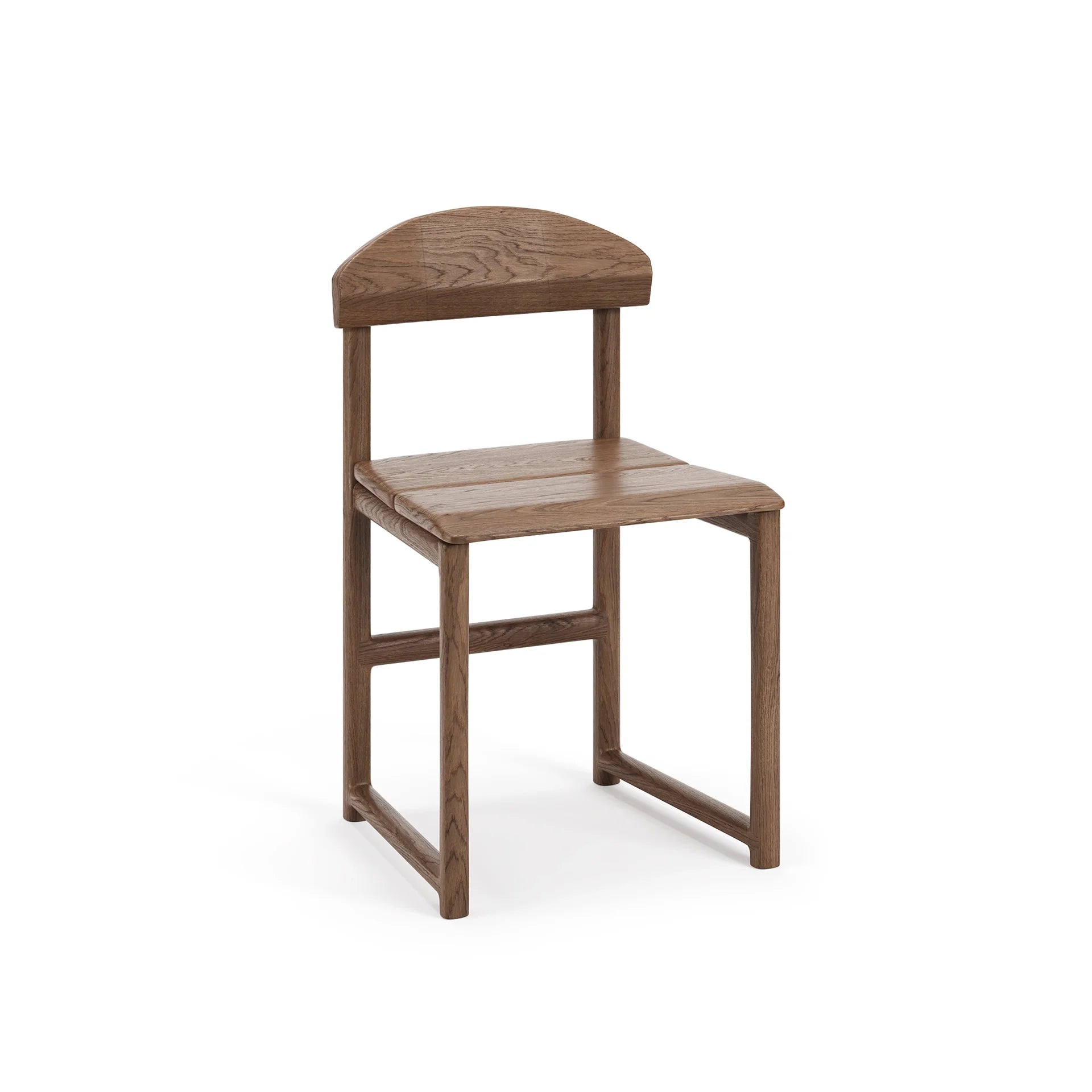 Front view of the Karin Dining Chair by Crea, crafted in solid dark oak with a sculpted seat and gently curved backrest, designed for a timeless Scandinavian dining space.