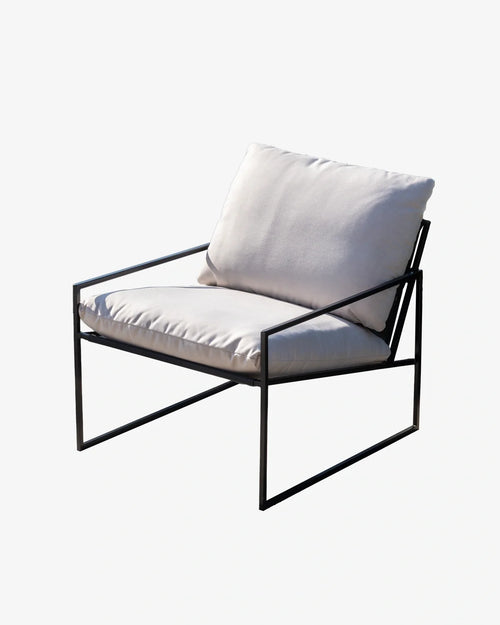 Kenny outdoor lounge chair with weatherproof cushions, perfect for stylish patios and gardens.