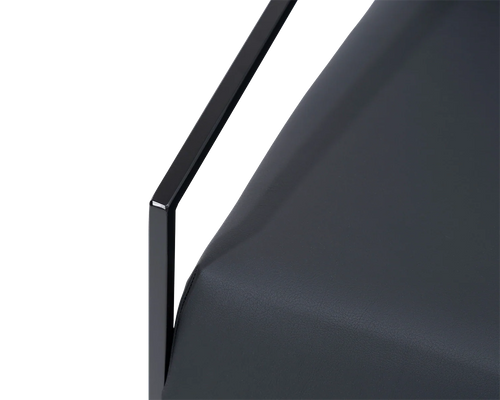 Kent Steel Armchair armrest detail showing black powder-coated steel frame with precision edge and seamless vegan leather upholstery | by Crea.
