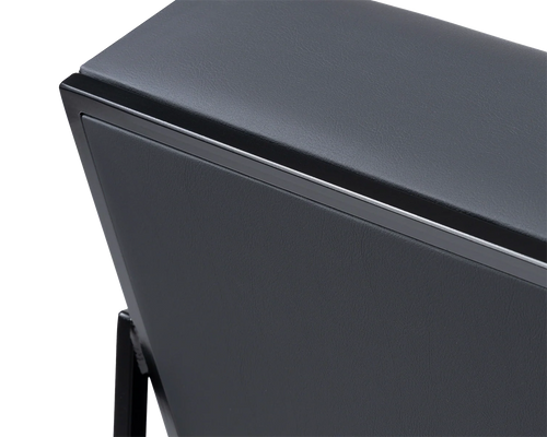 Kent Steel Armchair backrest detail showcasing matte black frame and black vegan leather upholstery with clean Scandinavian lines | by Crea.