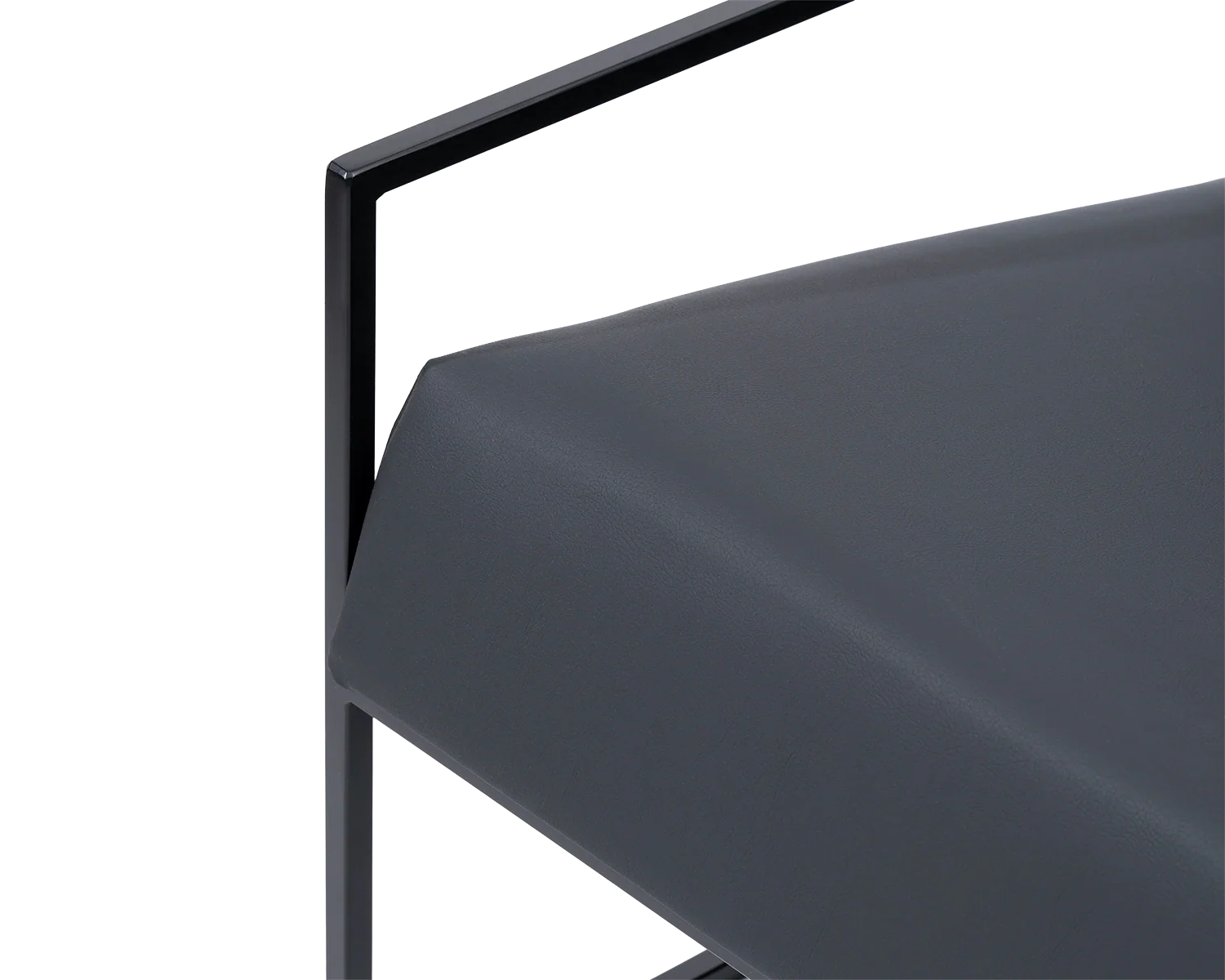 Detail of Kent Steel Armchair seat cushion in black vegan leather with crisp tailoring and minimal steel frame | by Crea.