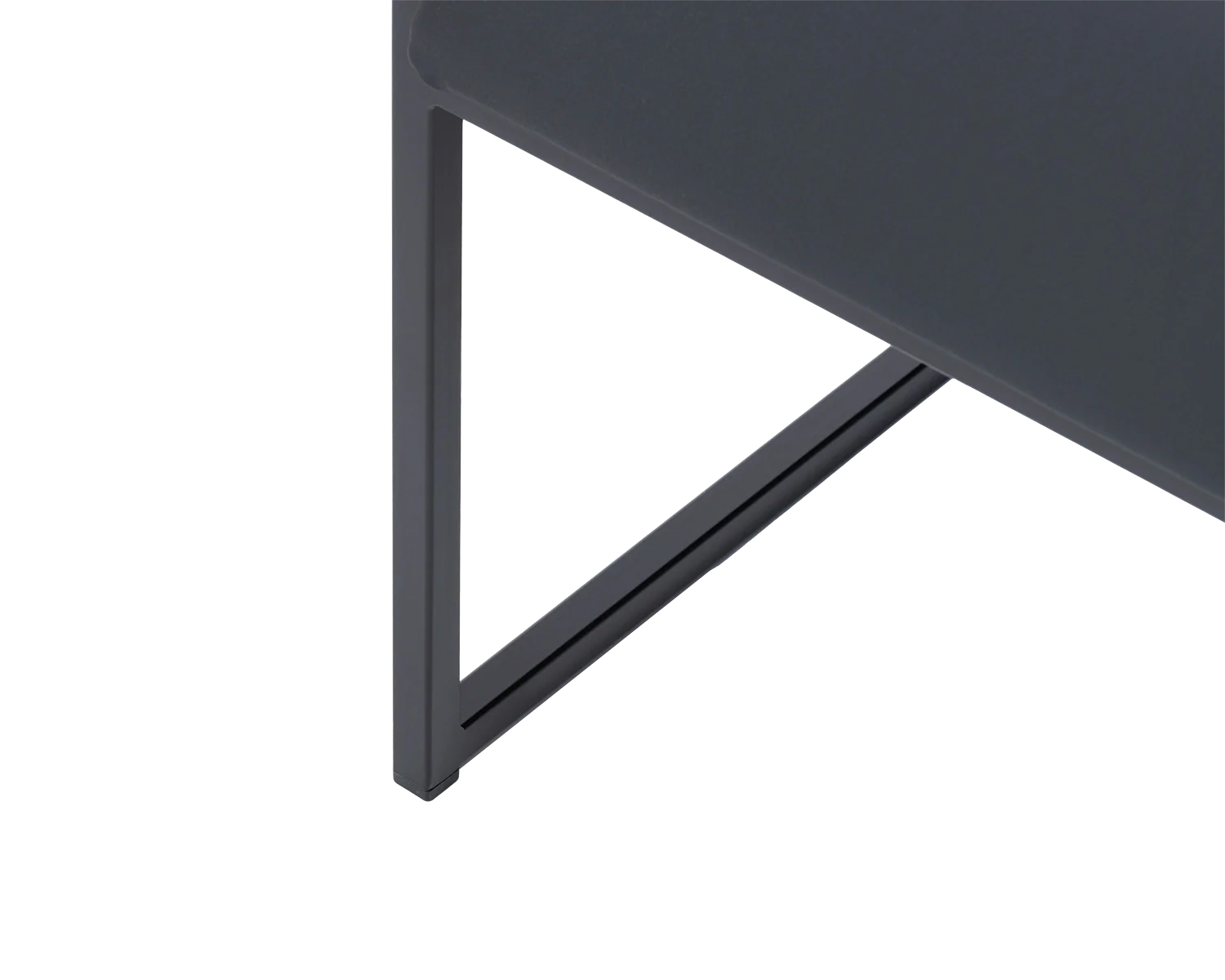 Kent Steel Armchair foot detail showcasing the angular black steel frame and supportive diagonal brace for modern structural integrity | by Crea.