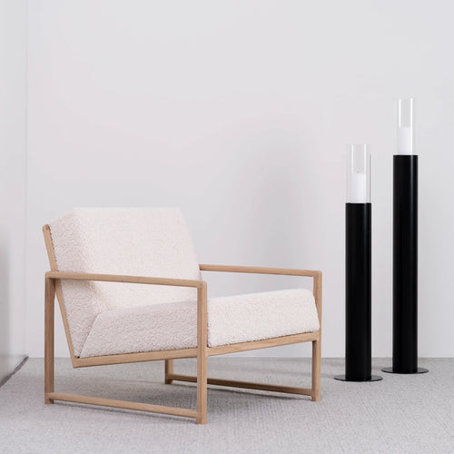 Kent oak armchair with ivory bouclé, designed for modern Scandinavian living spaces.