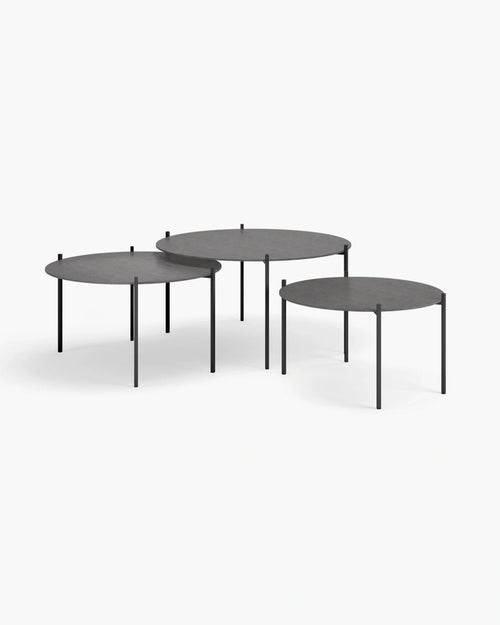 Leo coffee table set in black with Grafite dekton, featuring three sleek round tables with minimalist design.