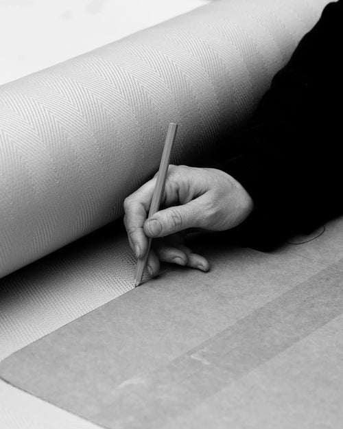 Close-up black-and-white photo of a craftsman