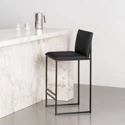 Philip bar stool with black leather seat and black frame, ideal for modern kitchen islands or bars.