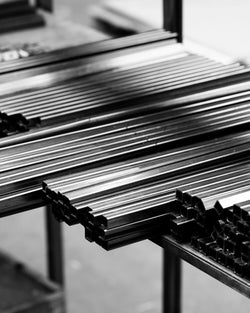 Neatly stacked steel tubes prepared for handcrafted furniture production at the by Crea factory. Highlights the precision, quality materials, and Swedish manufacturing process behind by Crea’s custom-made designs.