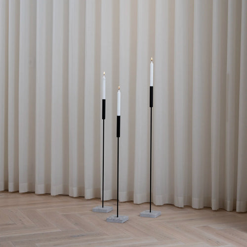 Vera floor candleholder set in black and moorland, featuring sleek lines and a matte finish, ideal for Scandinavian decor.