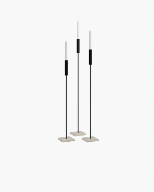 Vera floor candleholder set featuring black frames and moorland bases, showcasing Scandinavian design with strong lines.