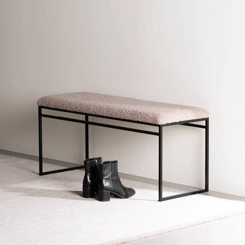 Wilma bench in black with greige bouclé, showcasing modern design and soft tones, perfect for serene interiors.
