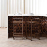 Black and white close-up of oak wood pieces precisely cut for joinery, showcasing the handcrafted quality and sustainable solid wood construction used in by Crea furniture.