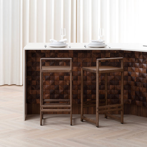 Black and white close-up of oak wood pieces precisely cut for joinery, showcasing the handcrafted quality and sustainable solid wood construction used in by Crea furniture.