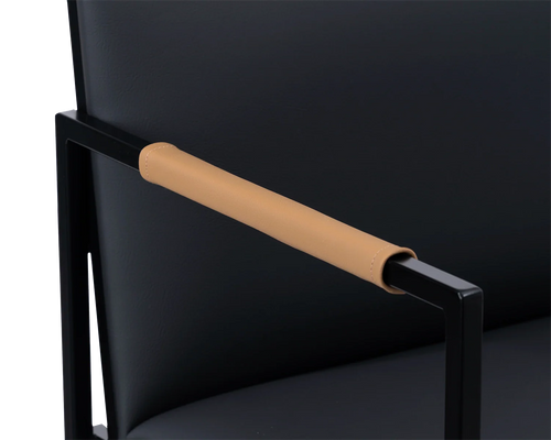 Detail of Bruno Bar Stool armrest in black frame with vegan leather cover | by Crea.