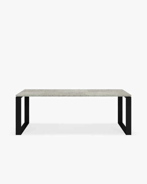 Diana outdoor dining table with black frame and Grafite dekton top, ideal for sleek outdoor living.