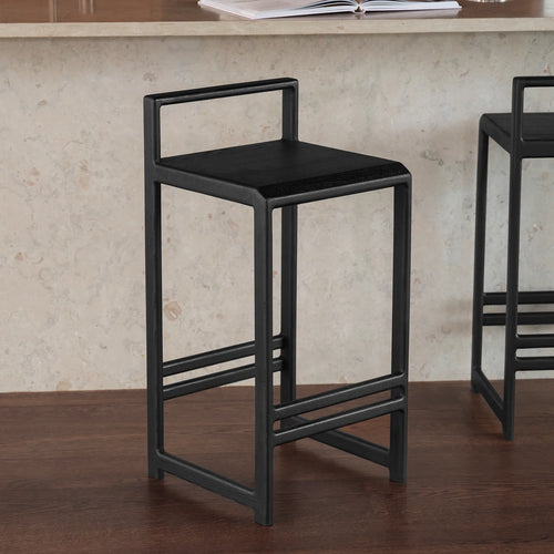 Ebba Bar stool in black oak, featuring a modern design that enhances any kitchen or bar space.