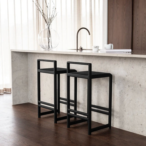 Ebba bar stools in black oak, stylish and modern, perfect for enhancing kitchen and bar spaces.