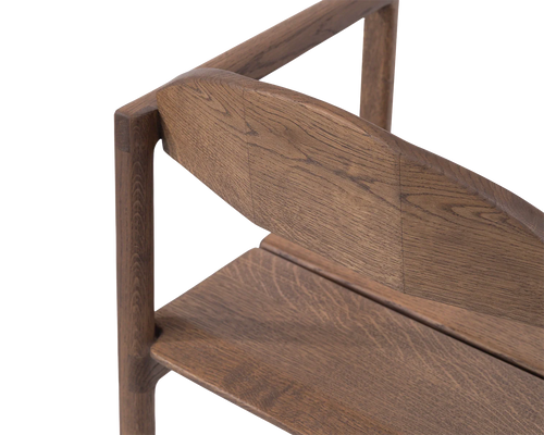 Erik Dining Chair back detail in dark oak, showcasing the smooth joinery and softly curved wood grain | by Crea.