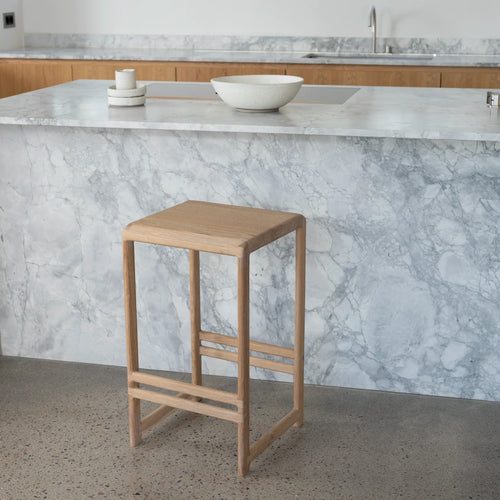 Eva bar stool in solid wood, modern design, perfect for kitchen islands and home bars.