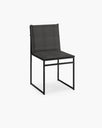 Isa outdoor chair in black onyx acrylic, featuring a modern, sleek design ideal for elegant outdoor spaces.