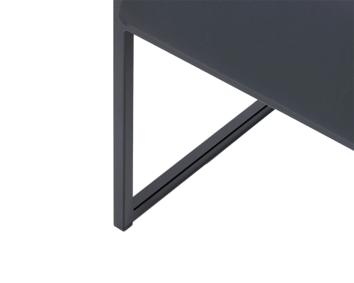 Kent Steel Armchair foot detail showcasing the angular black steel frame and supportive diagonal brace for modern structural integrity | by Crea.