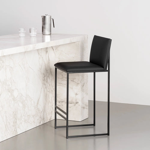 Philip bar stool with black leather seat and black frame, ideal for modern kitchen islands or bars.