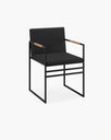 Sella dining chair in black with jade leather seat and coffee bean accents, perfect for stylish dining rooms.