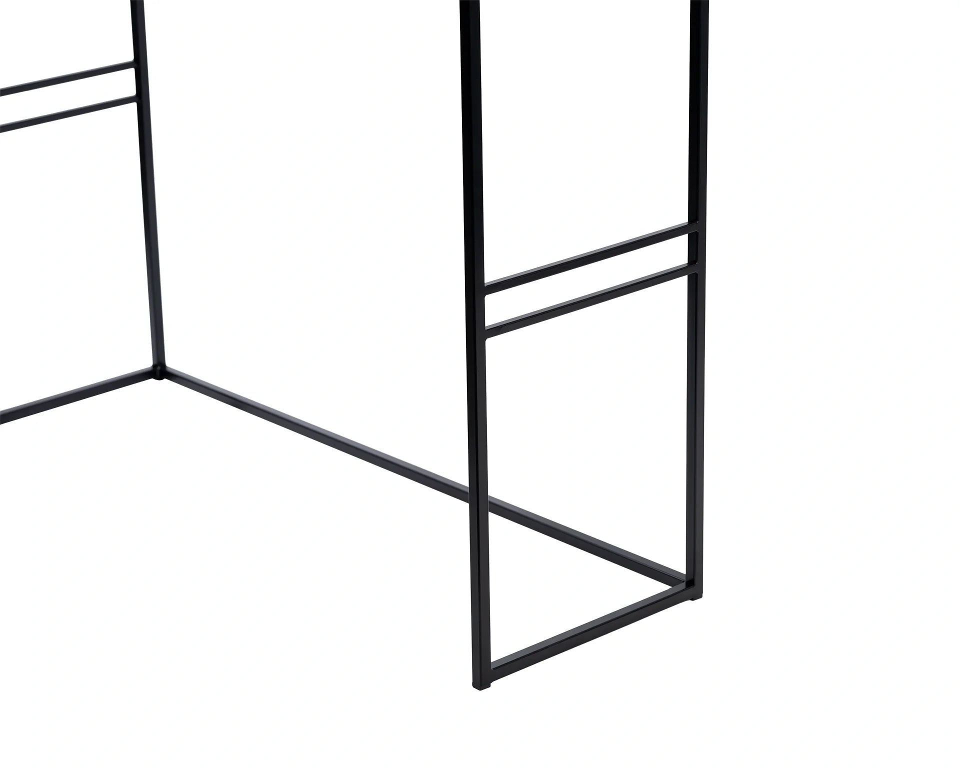 Close-up of black powder-coated steel frame of a minimalist Scandinavian sideboard, durable base with clean, geometric lines.