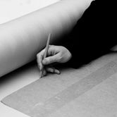 Black-and-white close-up of a craftsman